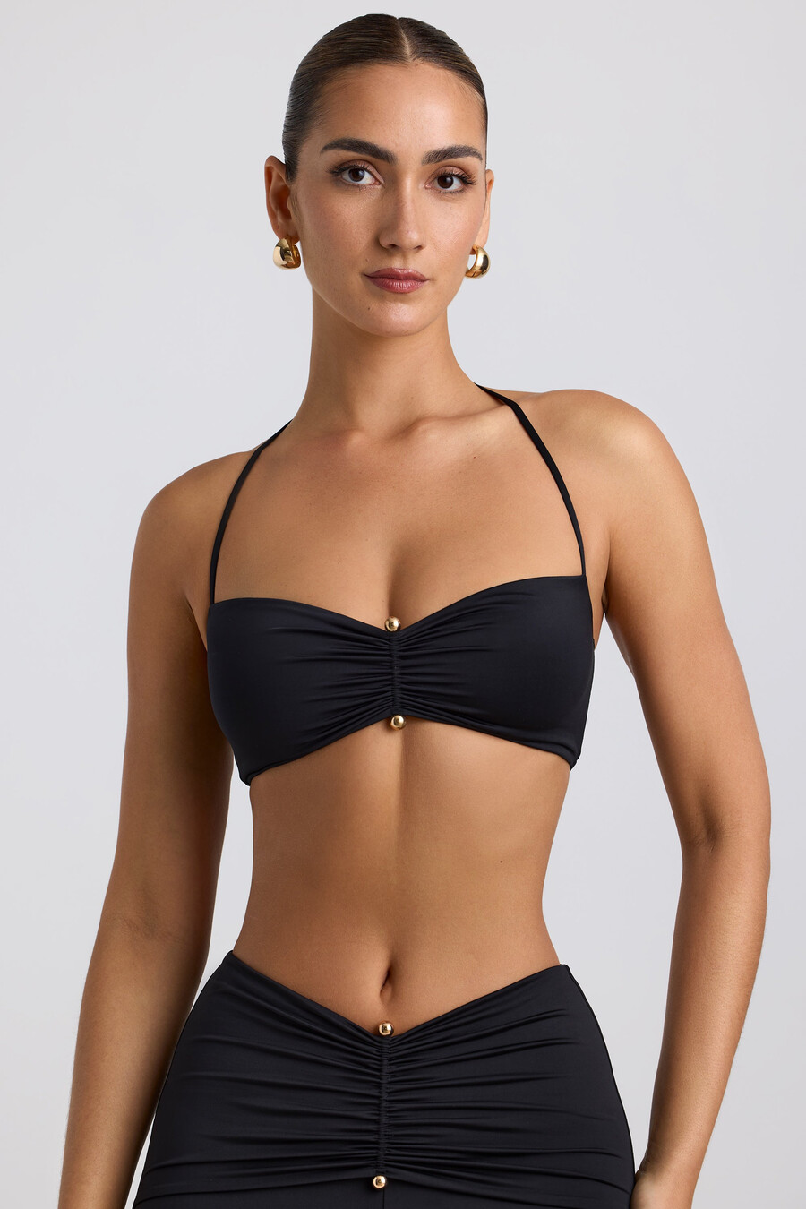 biustonosz typu halter z dzianiny slinky jersey hardware detail w kolorze czarnym